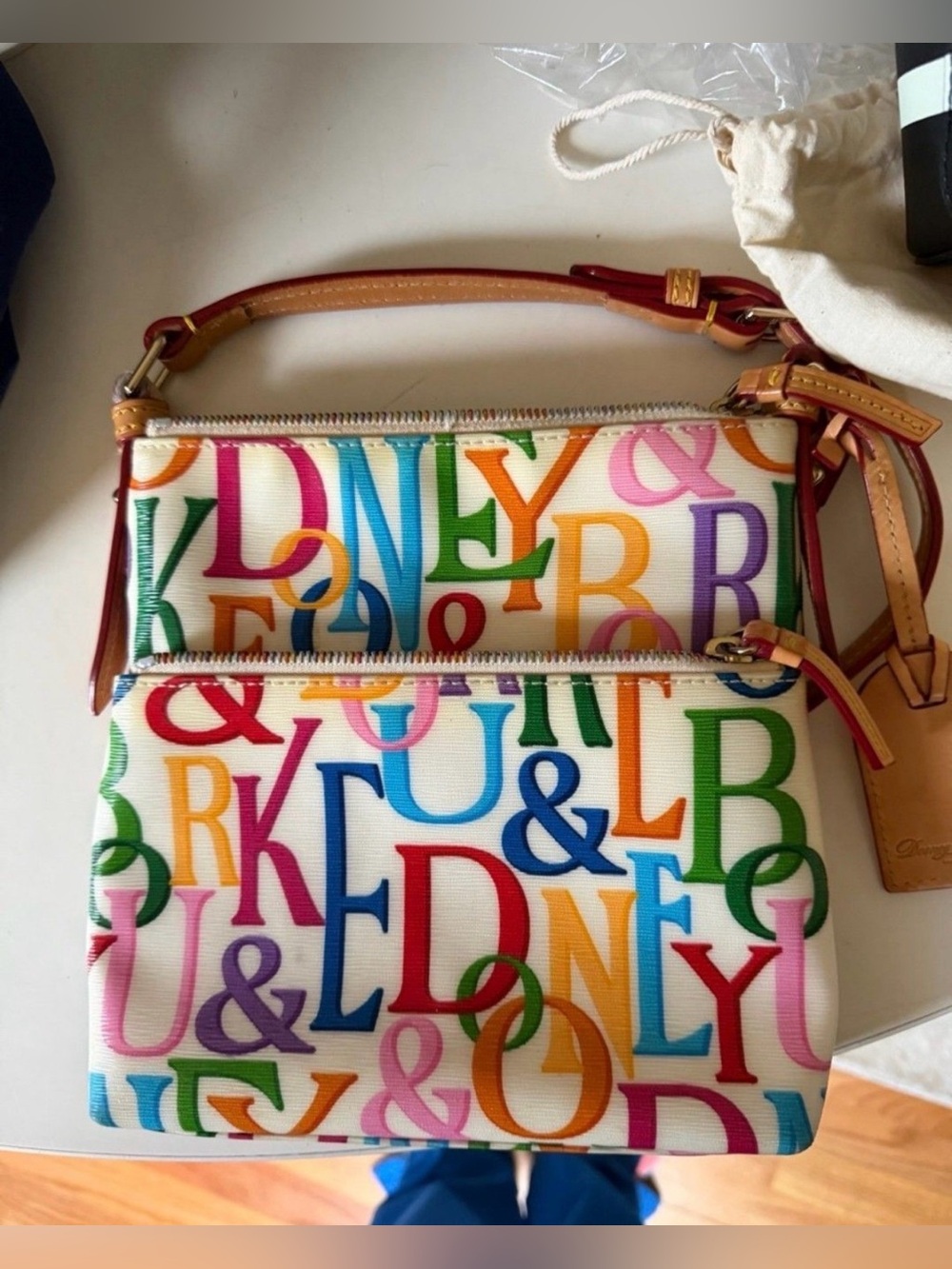 Dooney & Bourke White Rainbow Retro Grafica Letter Carrier Crossbody Bag